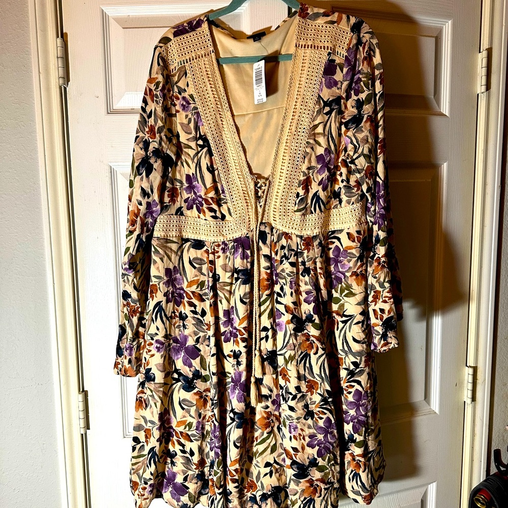 Women’s plus size dress hitting just below the knee.